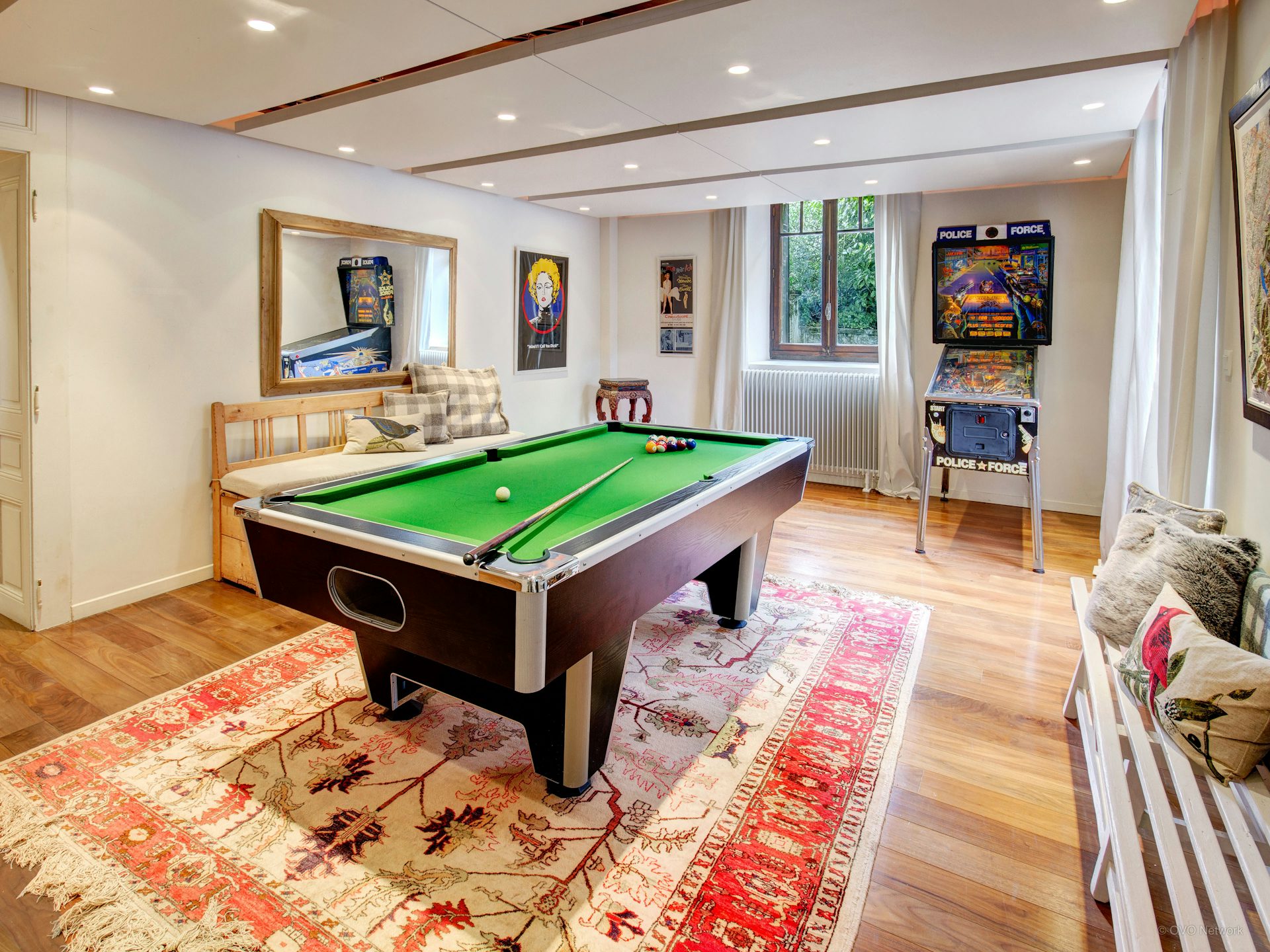 manoir-de-leschaux-game-room-with-rug-pool-table-game-console
